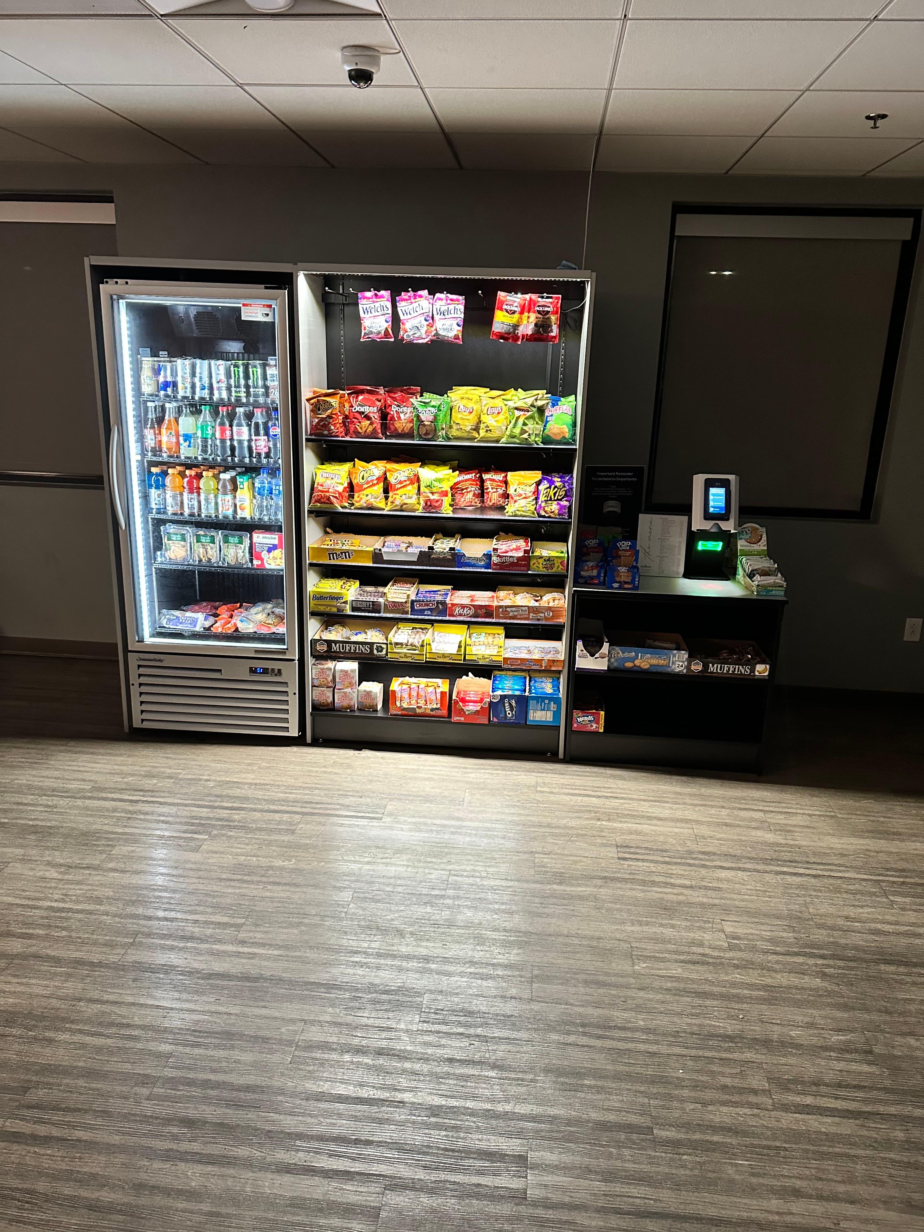 Complete micro market setup with snack shelves and cooler